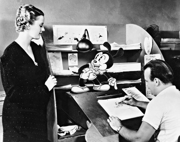 Actress Phyllis Brooks visits with Oswald and Tex Avery in this rare 1934 publicity photo - click to enlarge (courtesy of Devon Baxter)