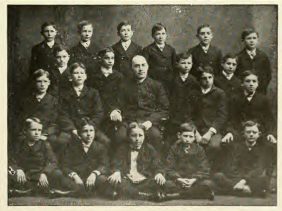 FIRST COMMUNION CLASS, 1904, ST. MICHAEL'S CHURCH.  Vincent Whitman is in the middle row (far right). His brother Stewart is in the top row (third to the left)  