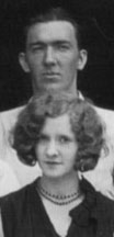 Ben Clopton poses behind Carman Maxwell's sister in this 1928 Winkler Studio staff photo. 